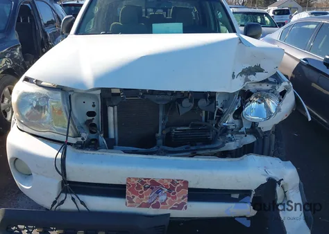 2009 Toyota Tacoma Base V6 из США, поврежденный, VIN 3TMMU52N49M014277